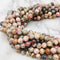 natural rhodochrosite faceted round beads
