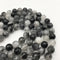 black tourmalinated quartz faceted round beads