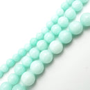 aqua blue green dyed jade smooth round beads