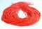 red orange bamboo coral smooth round beads