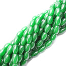 green dyed jade smooth rice shape beads 