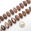 peach moonstone graduated center drill points beads