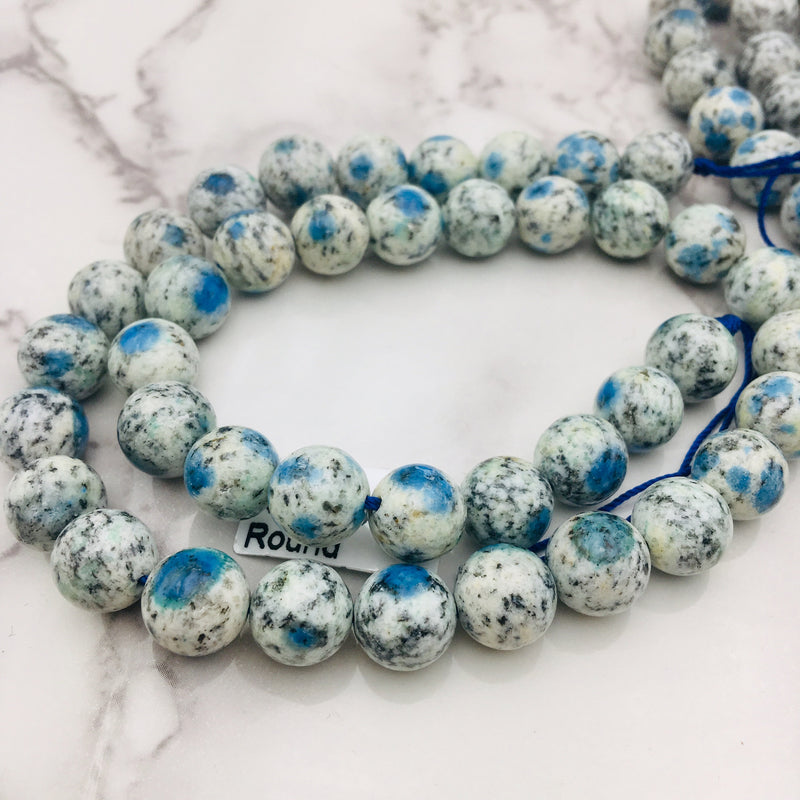 natural k smooth round beads