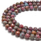 ruby kyanite faceted round beads