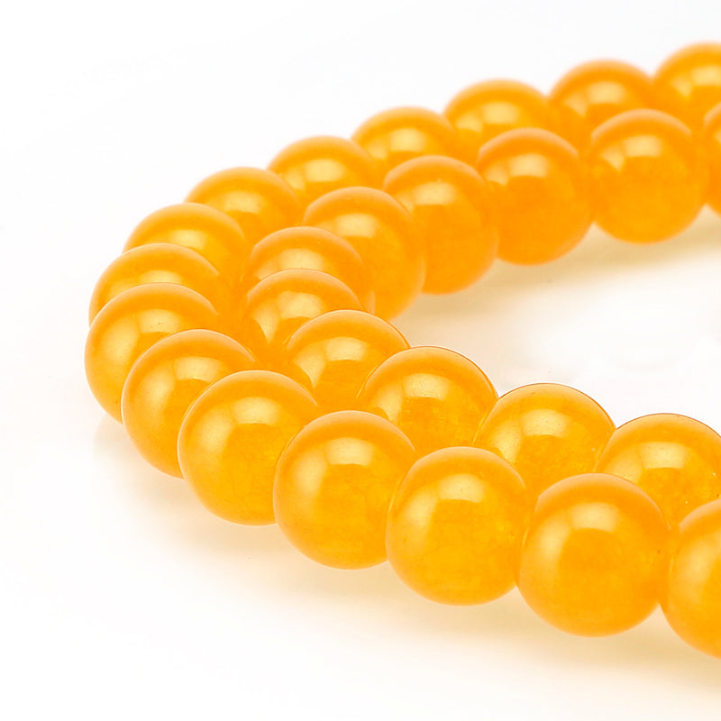 dark yellow dyed jade smooth round beads