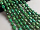 dark green turquoise smooth oval shape beads 