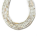 white turquoise round tube beads 