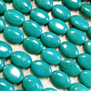 turquoise flat oval shape beads 