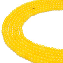 yellow dyed jade smooth round beads