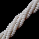 white bamboo coral faceted rondelle beads 