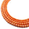 peach bamboo coral smooth round beads