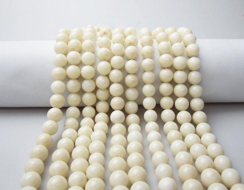white bamboo coral smooth round beads
