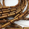 golden coral irregular round tube beads 