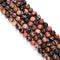 rhodonite faceted round beads