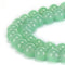 light green dyed jade smooth round beads 