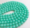 teal green quartz smooth round beads