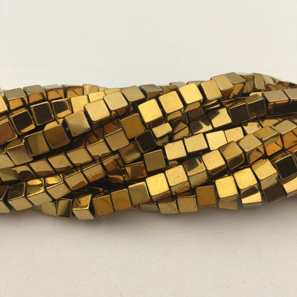 gold plated hematite smooth cube beads 