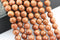 gold sandstone faceted round beads